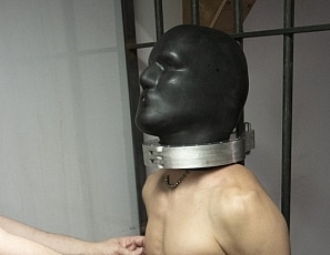 A016_MALEBONDAGE_FunInYossiesBasement_SethJoeYossie_HeavyRubberHood_BlackSyntheticSleepsack_A016