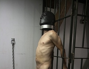 A016_MALEBONDAGE_FunInYossiesBasement_SethJoeYossie_HeavyRubberHood_BlackSyntheticSleepsack_A016