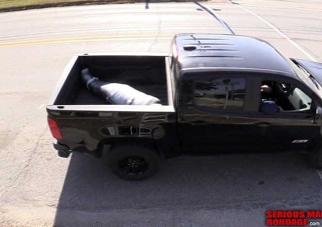 A083_MALEBONDAGE_YouAreIt_BindsEditedVideo_BindInSarcaugusInBackOfTruck