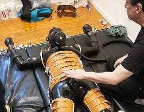 A112_MALEBONDAGE_Edged_Part3of3_SethClaudio_FullBodyTanLeatherBraceAndRubberBackRoom