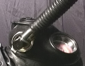 A147_MALEBONDAGE_StraitjacketNirvana_RubberSlaveDaltonMark_RubberSuitNeopreneSJOnBondageTableFrontRoom