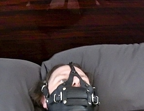 A194_MALEBONDAGE_TheAfternoonNap_TreverInSleevelessLeatherSleepsackOnBindsBed_TreverBlake