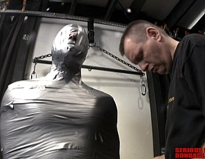A203_MALEBONDAGE_WrappedAndStrapped_DuctTapeMummification_MummyEdDaleOtherGuy